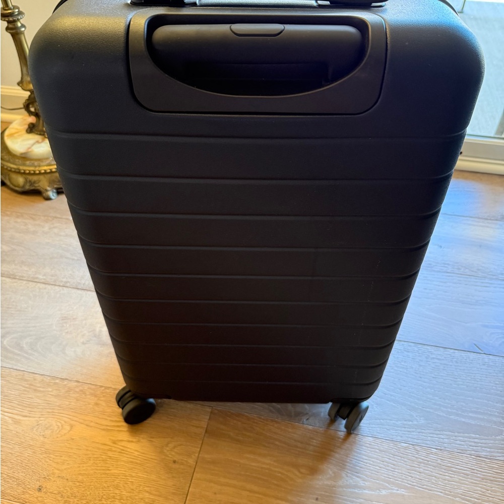 Away Carry-On Navy Blue Rolling Suitcase. Like-New Condition. Used Three Times.